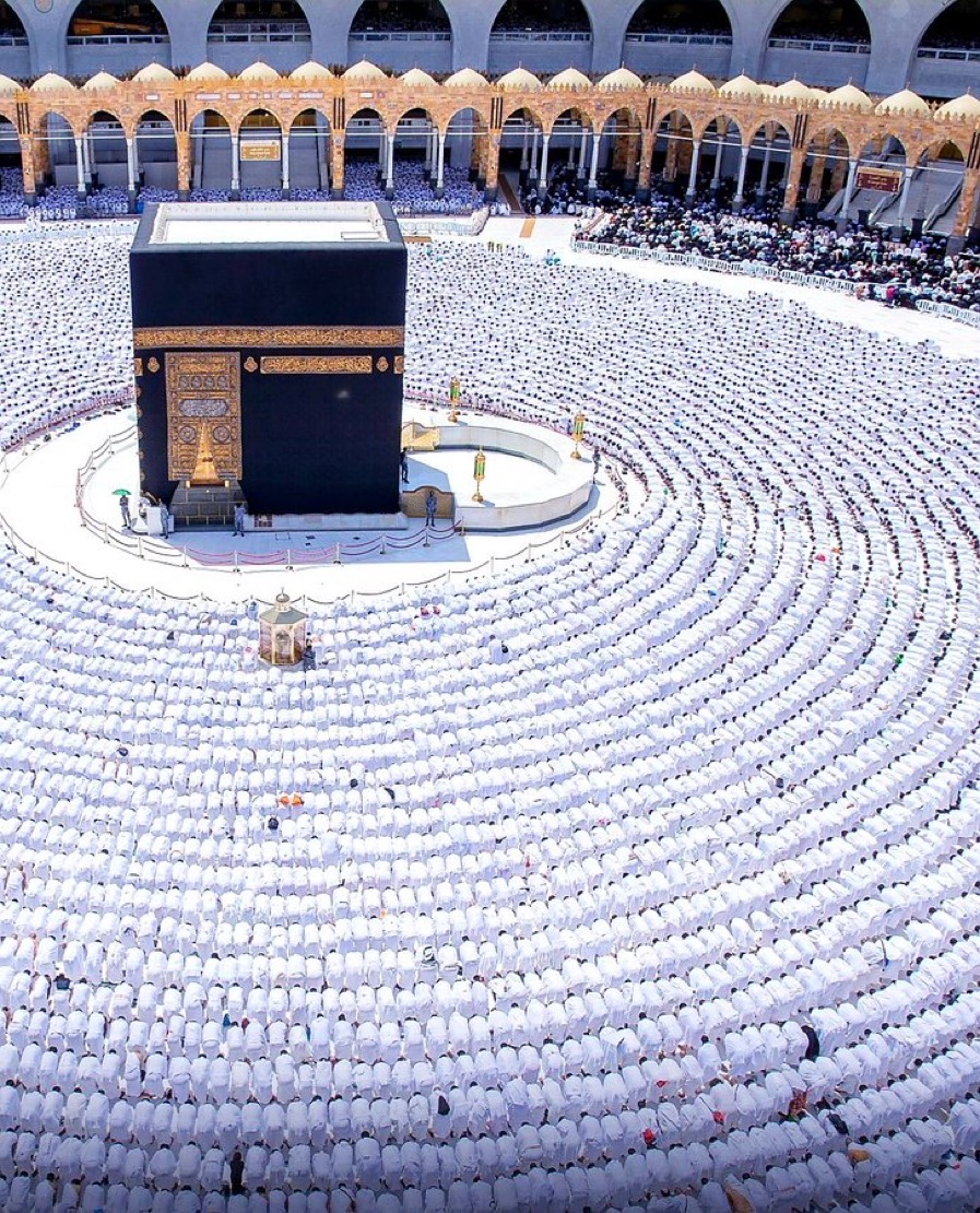 [The Kaaba] within [Masjid al-Haram] in Saudi Arabia