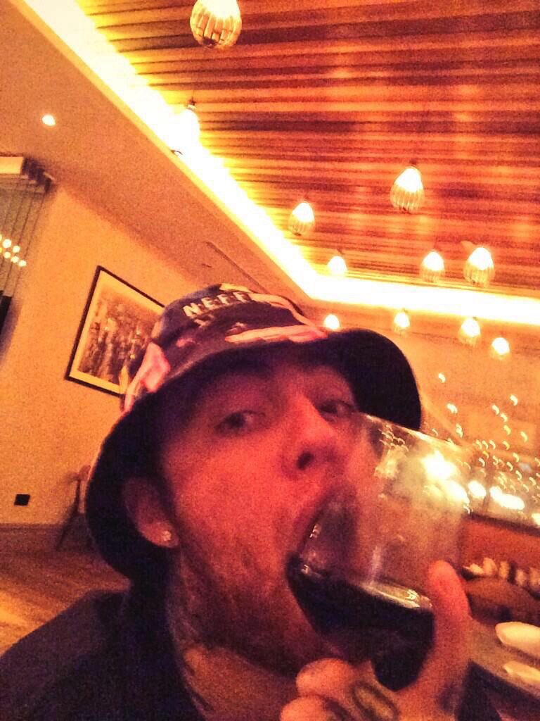 Mac Miller Enjoying a Glass of Red Wine, Date Unknown