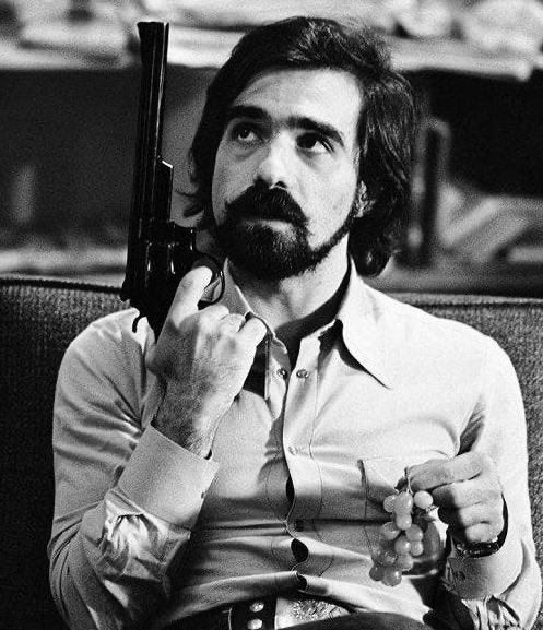 Martin Scorsese Holding a .44 Magnum Revolver On the Set of [Taxi Driver]. Shot by Steve Schapiro, 1975